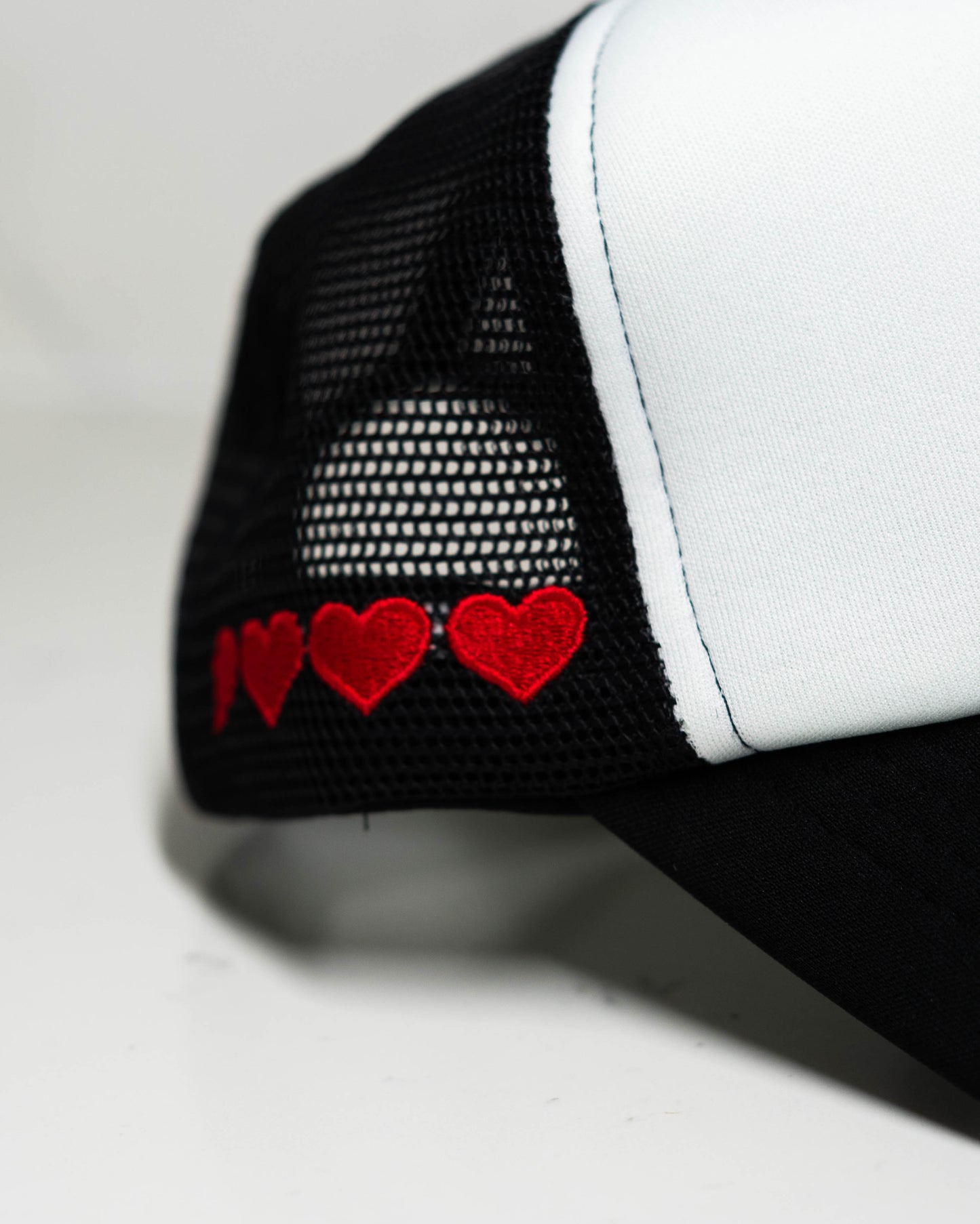 DTL Trucker Hat "Halo Hearts" | Black & White